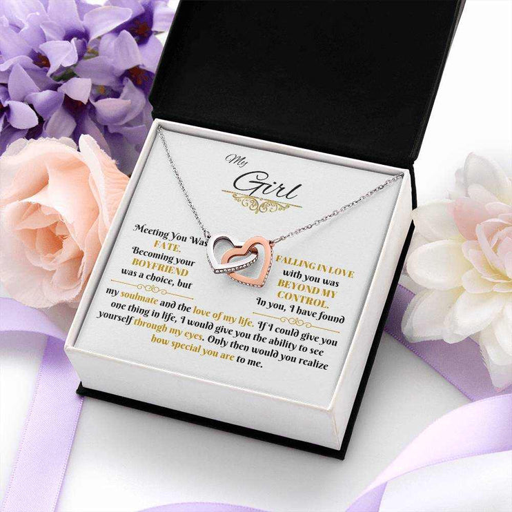 rose gold interlocking hearts necklace in soft box angled right