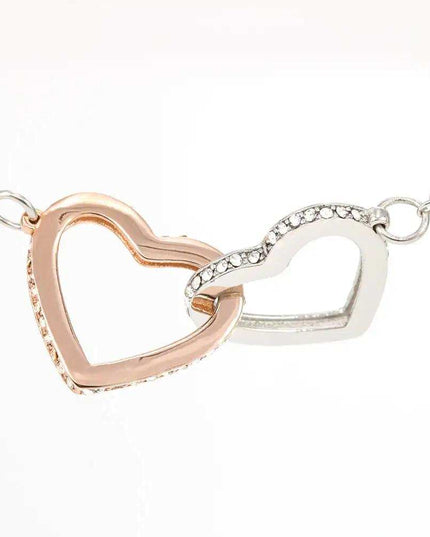 rose gold interlocking hearts necklace up close of charm