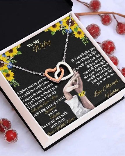 rose gold interlocking hearts necklace in two-tone box angled left