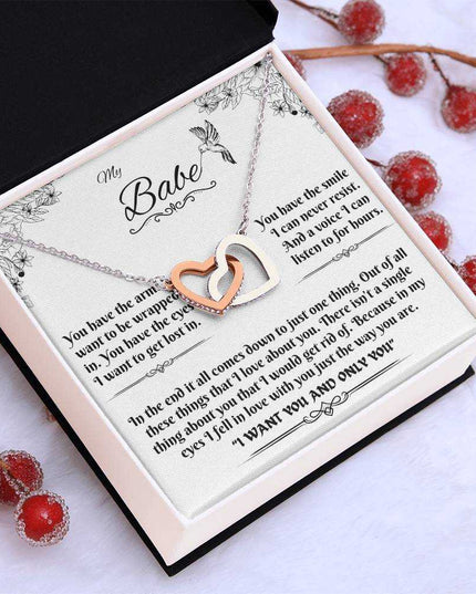 rose gold interlocking hearts necklace in a soft box