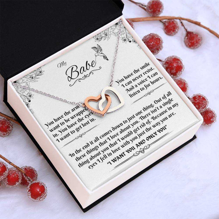 rose gold interlocking hearts necklace in a soft box