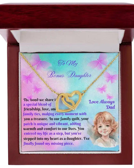 yellow gold interlocking hearts necklace in mahogany box up close