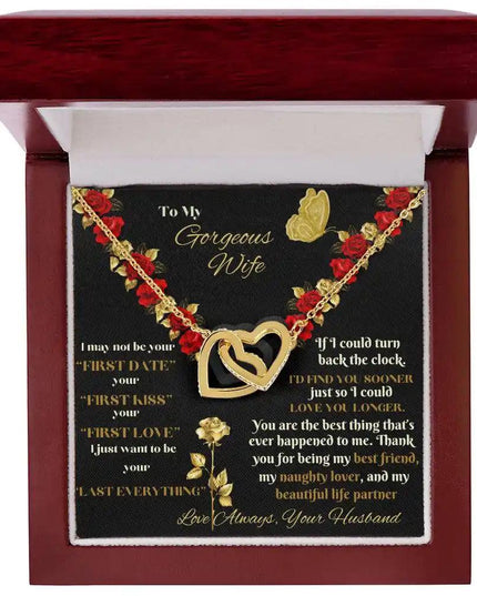 yellow gold interlocking hearts necklace in a mahogany box