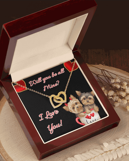 gold interlocking hearts necklace in a mahogany box