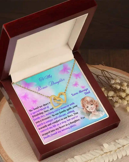 yellow gold interlocking hearts necklace in mahogany box angled left