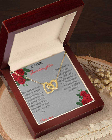 Interlocking Hearts Necklace with gold / gold charm in a mahogany box angle 2
