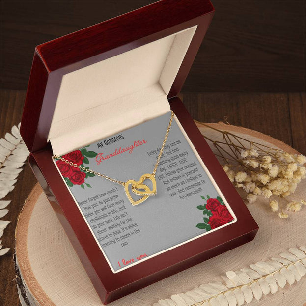 Interlocking Hearts Necklace with gold / gold charm in a mahogany box angle 2