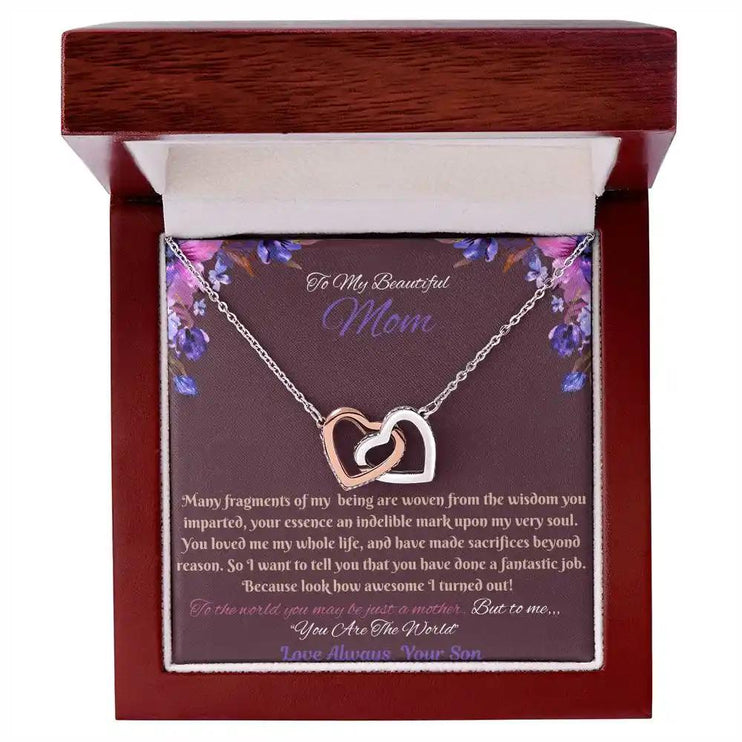 rose gold interlocking hearts necklace in a mahogany box