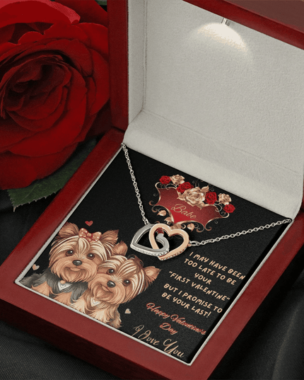 rose gold interlocking hearts necklace in a luxury box with LED light on with a red rose