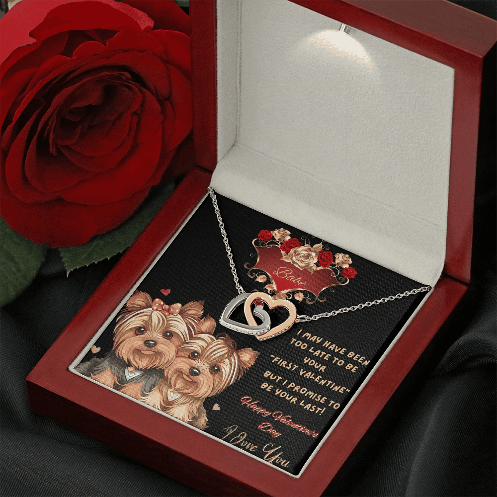 rose gold interlocking hearts necklace in a luxury box with LED light on with a red rose