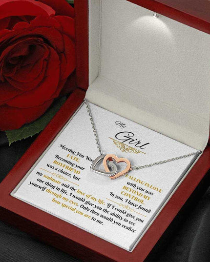 rose gold interlocking hearts necklace in luxury box angled right
