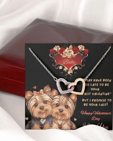 rose gold interlocking hearts necklace outside of luxury box on a message card