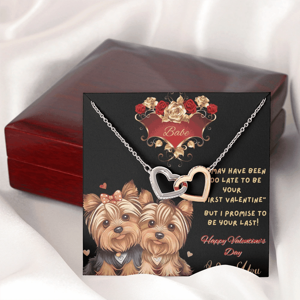 rose gold interlocking hearts necklace outside of luxury box on a message card