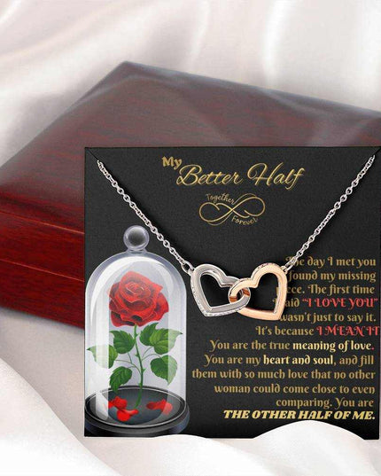 rose gold interlocking hearts necklace outside of closed luxury box