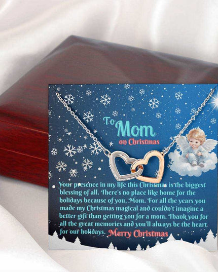 rose gold interlocking hearts necklace outside of closed luxury box