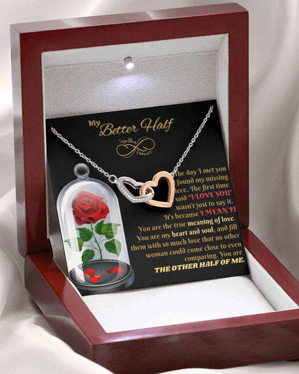 rose gold interlocking hearts necklace in luxury box angled left