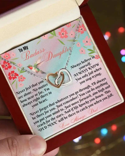 rose gold interlocking hearts necklace in mahogany box angle left