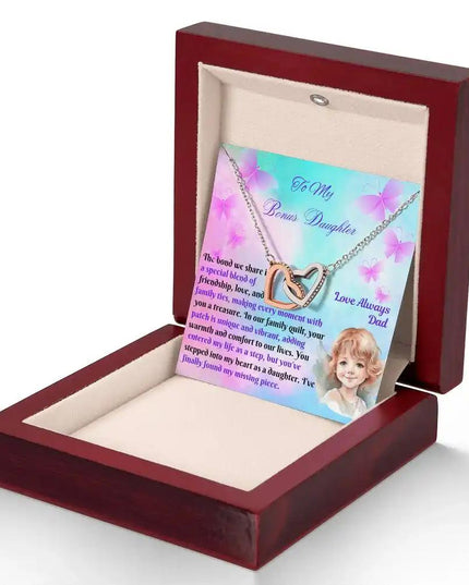 rose gold interlocking hearts necklace in mahogany box angled right