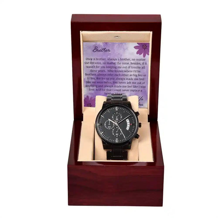A men's chronograph watch in a mahogany box with a to brother card.