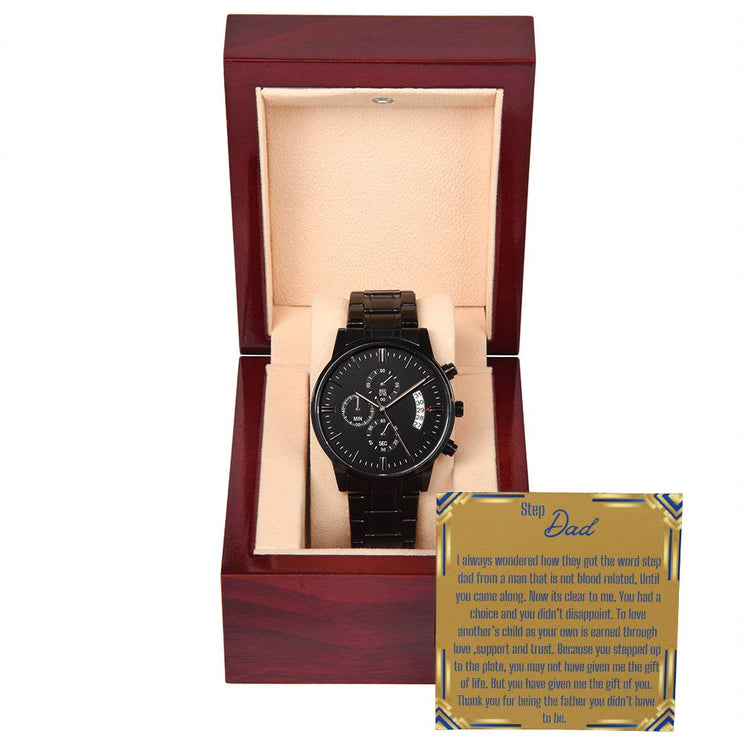 a men's chronograph watch in a mahogany box with a to stepdad card
