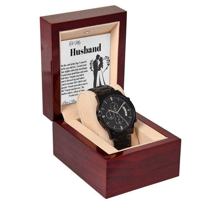 chronograph watch in a mahogany box angled to the left