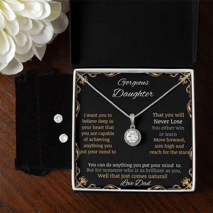 A Eternal Hope Necklace Earring Set on left side with a white gold charm and in a two-tone 