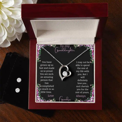 Forever Love Necklace Cubic Zirconia Earring Set with a white gold charm and a to granddaughter from grandma greeting card in a mahogany box with earrings on the left side of box with a white flower