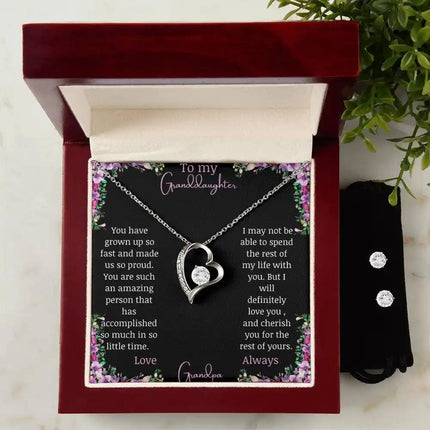 Forever Love Necklace Cubic Zirconia Earring Set with a white gold charm and a to granddaughter from grandma greeting card in a mahogany box with earrings on right side of box