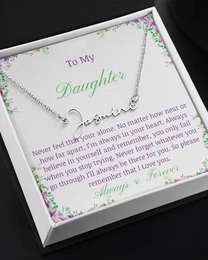 a polished stainless steel signature name necklace up close angled left