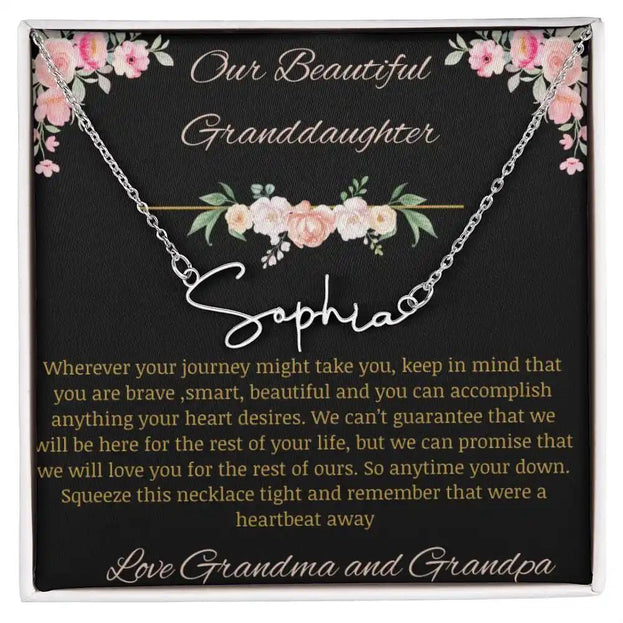 Signature Name Necklace with a polished stainless-steel finish and a to granddaughter from grandma and grandpa greeting card 
