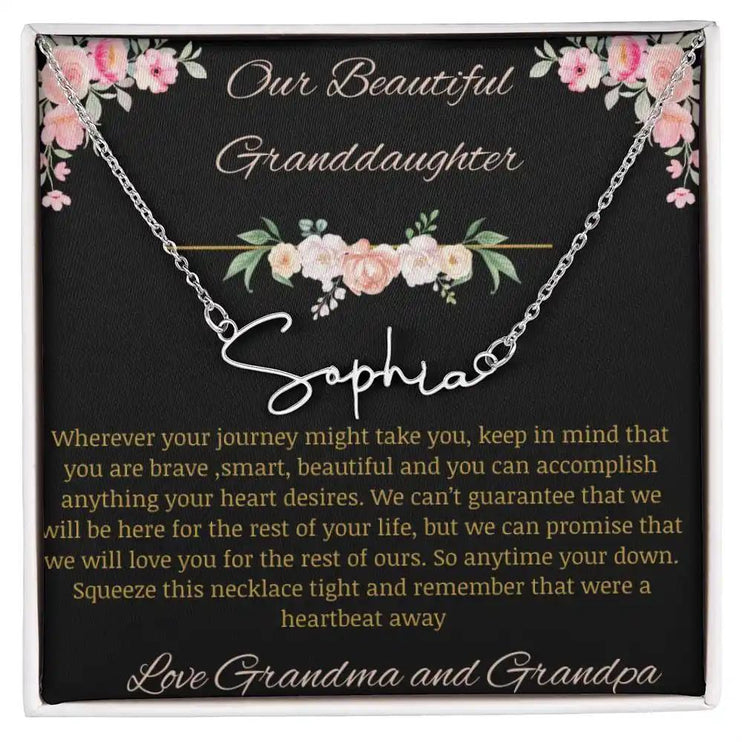 Signature Name Necklace with a polished stainless-steel finish and a to granddaughter from grandma and grandpa greeting card 