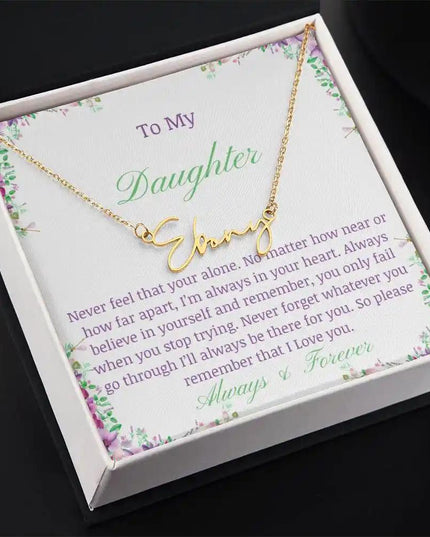 a yellow gold signature name necklace up close angled left