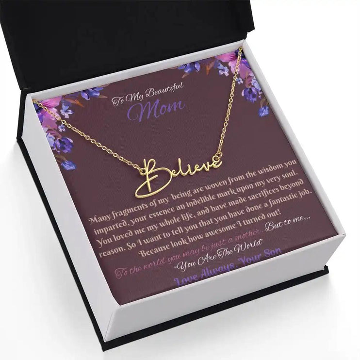 gold signature style name necklace in soft box angled left