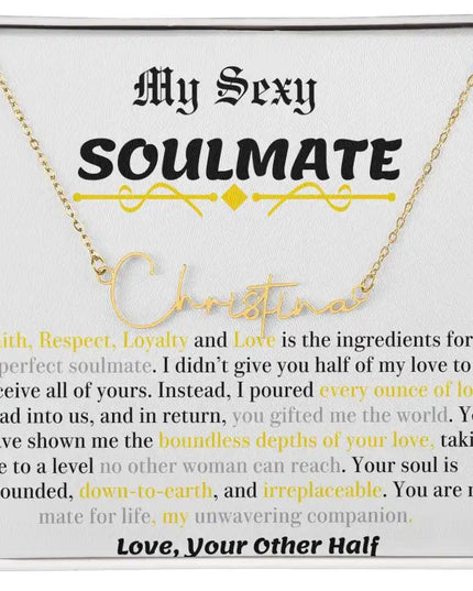 a yellow gold signature name necklace in a two-tone box.