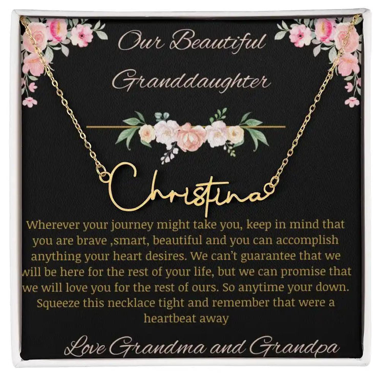 Signature Name Necklace with a yellow gold finish and a to granddaughter from grandma and grandpa greeting card 
