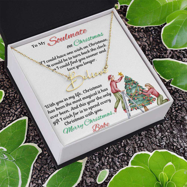 yellow gold signature name necklace in soft box angled left