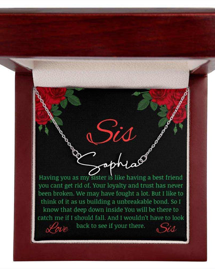Signature Style Name Necklace with a polished stainless-steel variant on a To Sis from Sis greeting inside a mahogany box.