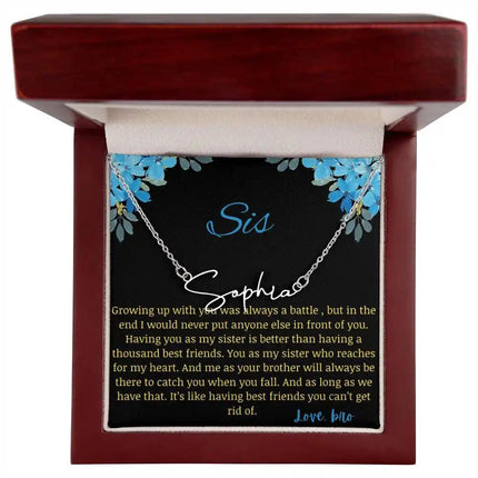 Signature Name Necklace with a polished stainless-steel charm on a to sis from bro greeting card in a mahogany box