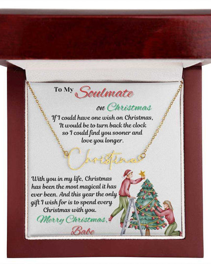 yellow gold signature name necklace in a luxury box up close