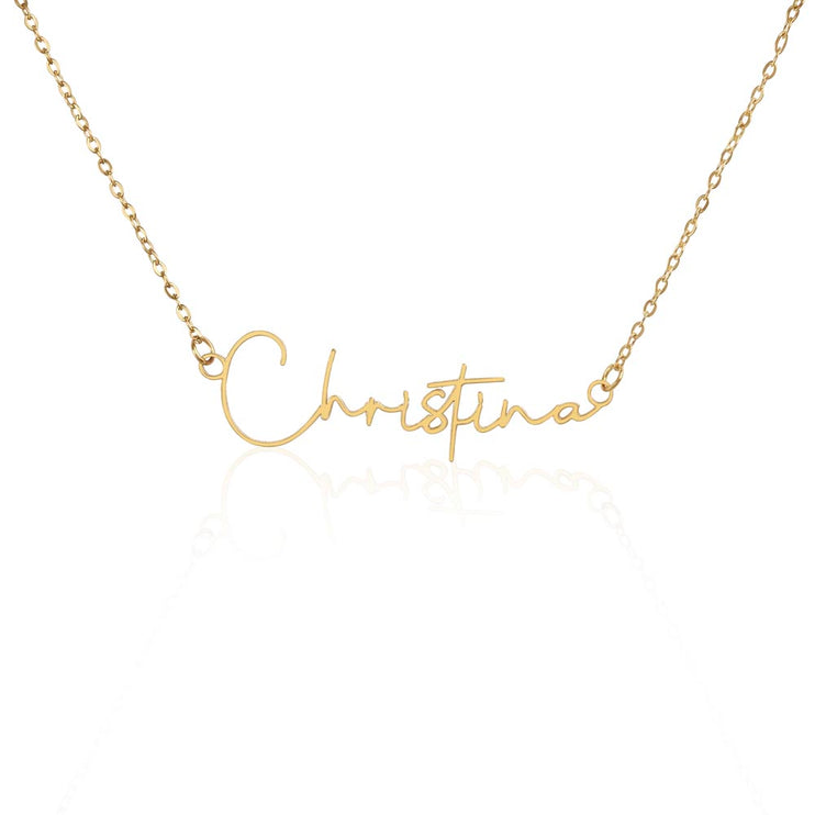 a yellow gold signature name necklace 