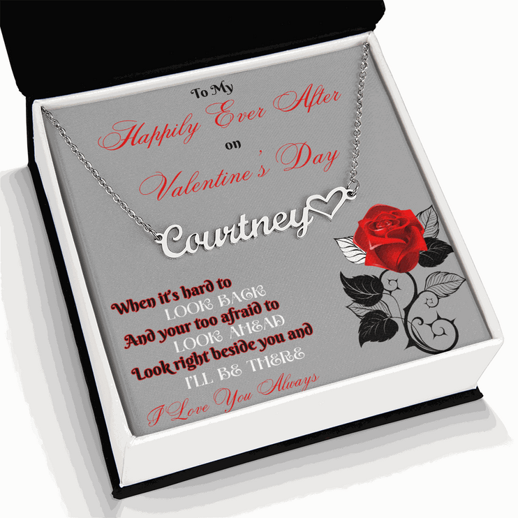 stainless steel name heart necklace in soft box angled to the left