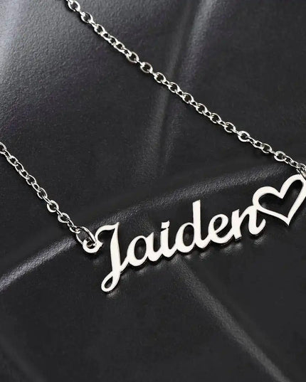 polished steel name heart necklace on black leather