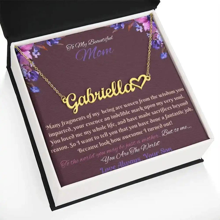 gold name heart necklace in soft box angled left