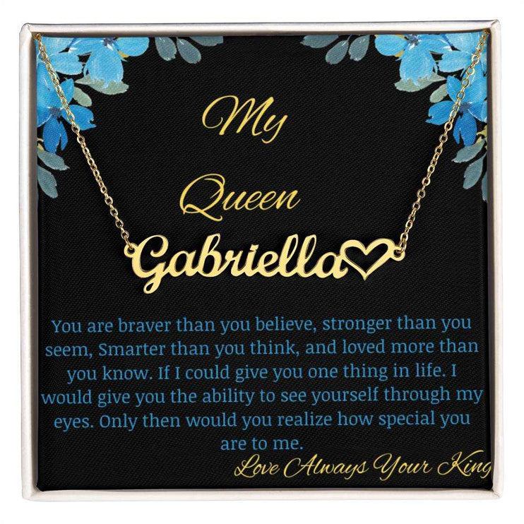 A yellow gold name heart necklace on a to my queen greeting.