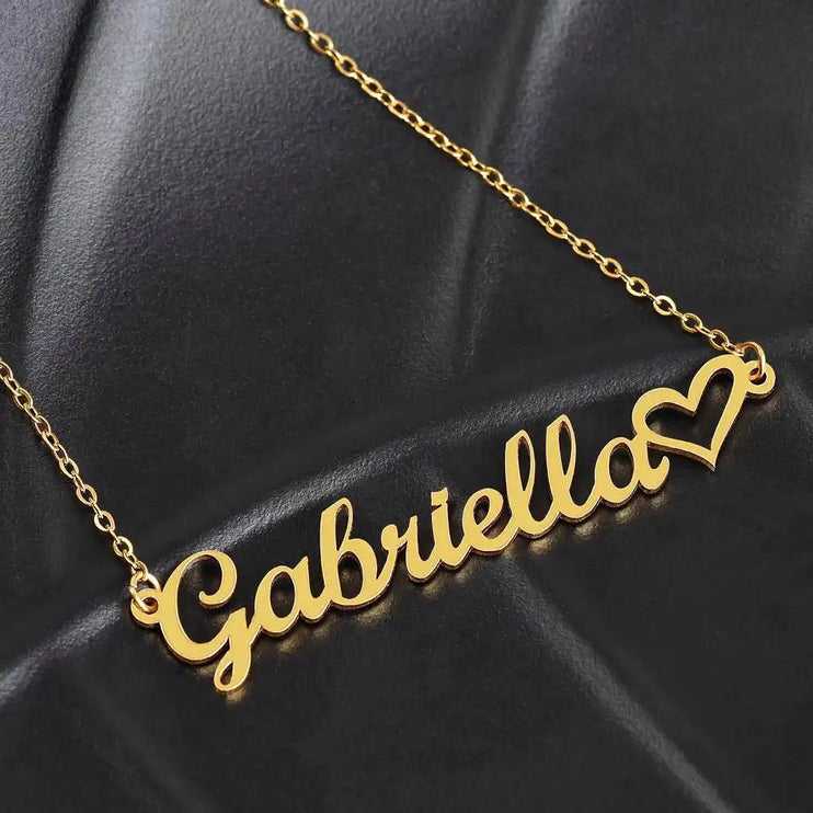 gold name heart necklace on black leather