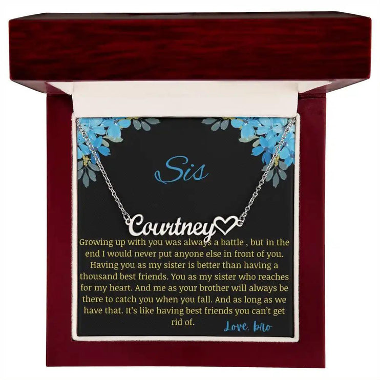 Name Heart Necklace with a polished stainless-steel charm with a to sis from bro greeting card in a mahogany box