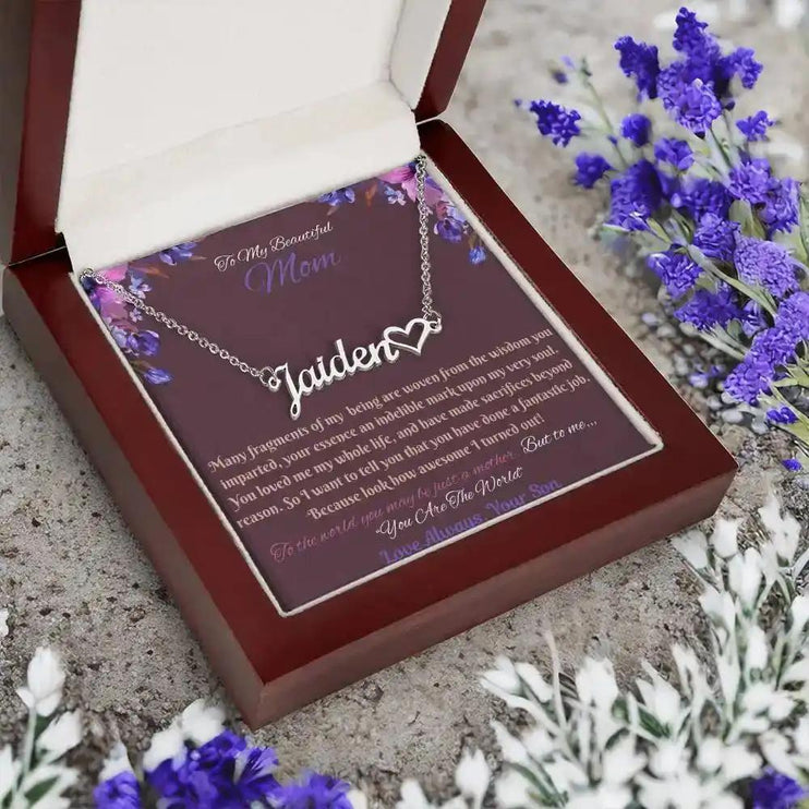 polished stainless-steel name heart necklace in mahogany box