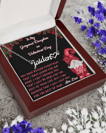 polished stainless-steel name heart necklace in a luxury box angled to the left