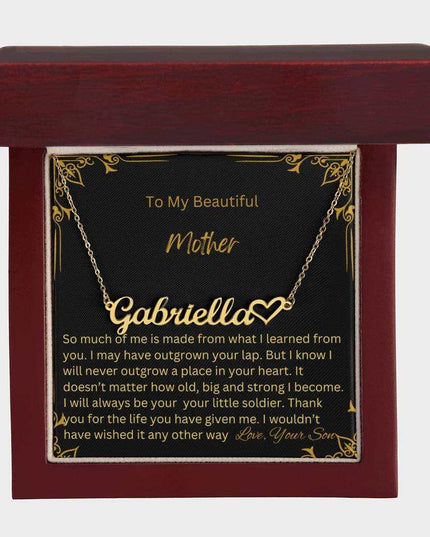 A yellow gold finish name heart necklace for mother in mahogany box.
