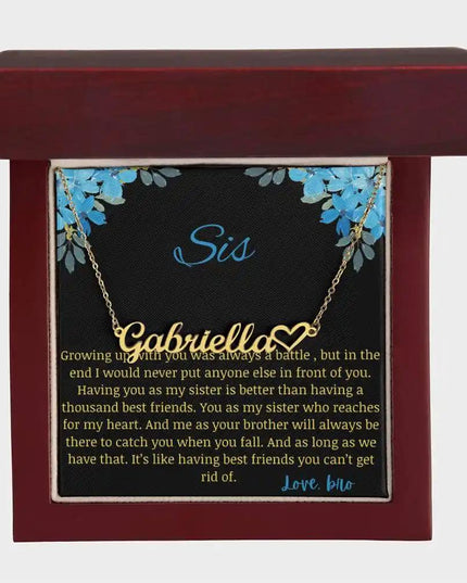 Name Heart Necklace with a yellow gold finish charm with a to sis from bro greeting card in a mahogany box
